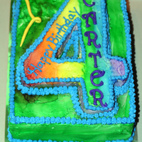 Carter's Birthday Cake 1/4 sheet cake with #4 carved out on top.