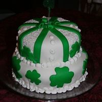 St. Patrick's Day Cake This was my first attempt at decorating a cake with fondant! The topper is from a hat and we found shamrock cookie cutters to use