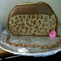 Happy Birthday Diva Purse cake with painted animal printCake is a chocolate cream cheese pound cake covered in MMF