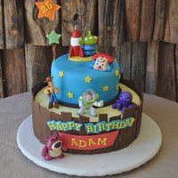 Toy Story Cake The figures were toys, everything else was fondant. ;)