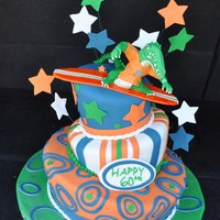 Surfing Gator This is a custom topsy turvy cake for a Fla Gators fan who loves to surf.