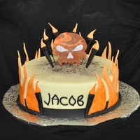 Flaming Skull Cake Flames and candles made from fondant, skull from gum paste. Inspired by party invitation.