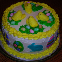 Easter Peeps Cake I made this cake for the church Easter egg hunt. It's a 4 layer 10 inch round yellow cake with lemon mousse filling, buttercream,...