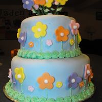 Tiered Fondant Flower Cake I made this fondant cake as my finale cake in the cake decorating classes I took.