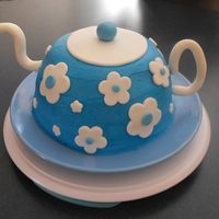 Teapot Cake I made this cake for a tea party birthday. This is just my first shot, the final cake will be made in a few days. Any tips would be GREATLY...