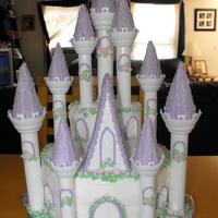 Castle Cake I made this castle cake with the Wilton Kit. VERY time consuming but I had fun every minute doing it. It was a big hit!