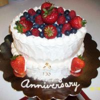 Anniversary Cake I made this for my parents 44th anniversary. Lemon with raspberry covered in bc and fresh berries. My friend liked it so much she wanted...