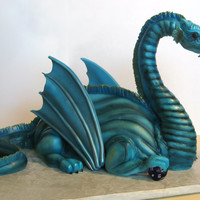 Dragon Groom's Cake This is a groom's cake - white cake with cream cheese frosting. I made the wedding cake too and will upload it later.