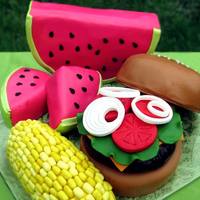 Picnic White cake with mascarpone / cream cheese filling & white cake with strawberry cloud filling. All covered in fondant. The corn kernels...