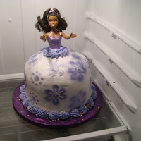 Barbie made with a real barbie doll and 4-8" round cakes covered in bc then airbrushed