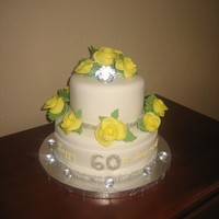 60Th Wedding Anniversary Cake This cake was for a 60th (!!!) wedding anniversary.The color of this milestone is yellow and diamonds are the stone.