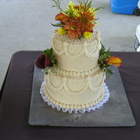 Round Wedding Cake Round wedding cake with fresh flowers.