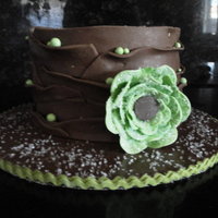 Death By Chocolate! Chocolate Chocolate Chip Poundcake with Chocolate Hazelnut Buttercream topped with Chocolate Fondant. Gumpaste accents - Sprinkled with...