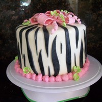 Zebra Stripe Birthday Cake Per my daughter's request for her 12th birthday. Zebra striped cake with pink and green accents.