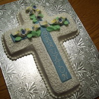 Baptism For Brauxton This is for my grandson, Brauxton. It has buttercream icing and gumpaste flowers.