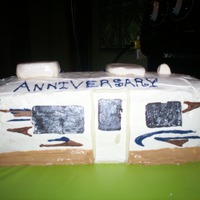 Rv Cake An anniversary cake I made for my parents 44th anniversary. Whipped it up real quick in a day. Butter cream frosting and chocolate accents...