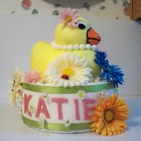Duck Meadow Cake I made this for a friends birhtday. She really loves ducky and so I made her a elegant rubber duck with flower all around. She loved it as...