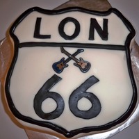 Route 66 Birthday Cake I did this for my Grandpas 66th birthday which is also on thanksgiving! It was a bit complicated but it was fun!