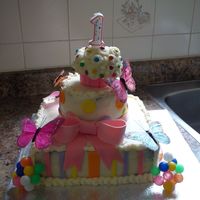 1St B-Day Cake Vanilla cake with Lemon cream cheese filling & frosting. MMF accents.