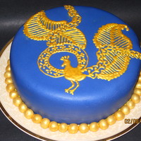 Peacock Cake My sister wanted to have chocolate cake, I took the opportunity to try RI piping for the first time (also painting with lusture dust). Did...
