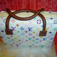 My First Purse Cake Surprise birthday cake made as a gift for a young woman who always treats people with grace and good humor and loves purses.