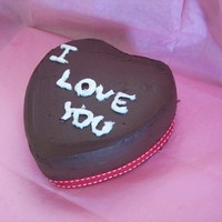 I Love You Cake Dark Chocolate Raspberry cake with a creamy dark chocolate raspberry center, made as a pratice cake for Valentine's day, not all that...