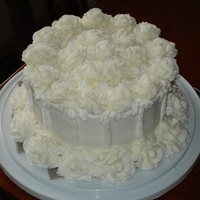 My First Roses! I had so much fun learning how to make these roses, that I just went crazy on my cake!