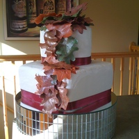 Fall Leaves Bridal shower cake...fall themed. I made the leaves out of gumpaste (my first time using gumpaste) and them covered them with shimmer dust...