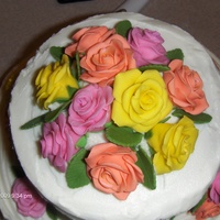 Pink, Yellow And Peach Fondant Roses Fondant roses for Wilton Course 3 Final Cake
