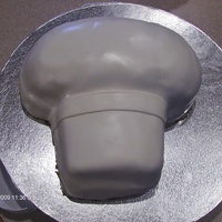Chef Hat Cake Cake I made for my BIL who is in culinary school. WASC cake, strawberry filling, vanilla flavored fondant.