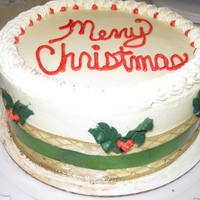 Holly Leaves & Berries Mocha Spice cake filled with Almond buttercream.