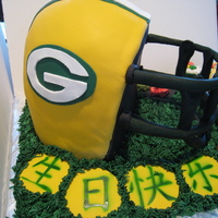 Green Bay Packers Helmet The Green Bay helmet was made with yellow cake, Bavarian cream filling and covered with Chocolate buttercream. All of the Sushi, chop...