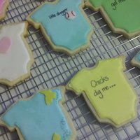 Baby Onesie Favors Made these for a shower this weekend that ended up being postponed. =o( NSFC with RI, fondant decorations, and food coloring pens