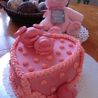 The Little Piglets Yellow cake covered with fondant and accents in BC. The birthday girl loves hearts and pigs, and here is the cake result! The pigs were...