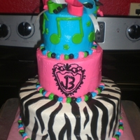 Alex's Girly Zebra Jonas Brother's Cake! For a super girly-girl who was turning 12, loves bright colors and the Jonas Brothers.. so we pulled it all into one design. All iced in...