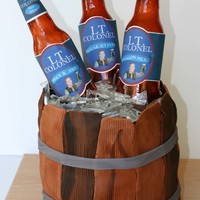 Beer Bottle Cake Second promotion cake I made for the hubby... this was the fun one! Made my own beer bottle mold and labels.