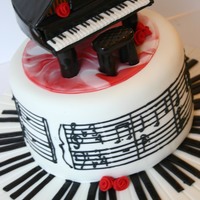 Piano And Music Cake Made for our piano teacher. If you look closely you'll notice that the music on the side is the Happy Birthday tune. It took me a...