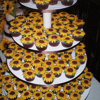 Sunflowers And More Sunflowers. 300 sunflower cupcakes for a wedding. Whew!