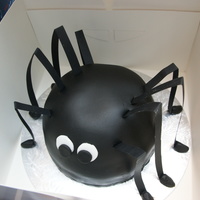 Spider My first attempt at a spider. Made for my kids' school fete. Chocolate sponge with buttercream filling. Covered in fondant. Legs are...