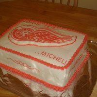 Detroit Red Wings Birthday Cake Chcolate cake with hazelnut chocolate filling, covered with crusting buttercream. The Red Wing logo was created using the Frozen...