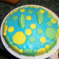 First Time Using Fondant Icing Just thought I would use circles for my first attempt. Did not take a class, tried this on my own.