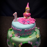 Princess And Her Cars This was for a little girl who was turning 1. The request was for a princess cake and we were asked to incorporate dinkie cars since she...