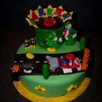 Super Mario This was our 2nd request for a Super Mario cake. I think we stepped it up a bit from our first attempt at these guys!