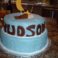 Under The Moon And Stars The moon and stars were made out of chocolate and it was the hardest thing ever so only one star made it. The baby and letters are fondant...