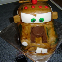 Tow Mater Cake Red velvet cake with buttercream and MMF. This cake turned out very cute!