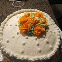 My Fisrt Attempt To Bc Roses Butter cream icing and roses. WASC cake with pudding filling.