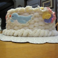Flowers Basket WASC, covered in butter cream, dulce the leche mousse filling and RI flowers/