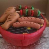 Bbq Grill Omg! It was so hot in my kitchen the day I made this cake. I had so much trouble with the fondant! But I guess it turned out okay.....