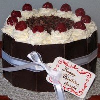 Black Forest Cake 6" black forest cake wrapped in chocolate