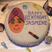 My First Cake That I Made For A Customer. This cake is a marble cake with a ganache filling, frosted with buttercream. The fondant on the cake is a homemade white chocolate fondant...